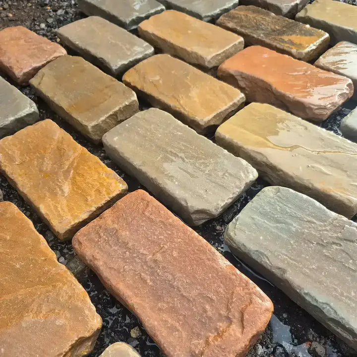 Raj green sandstone tumbled cobble setts